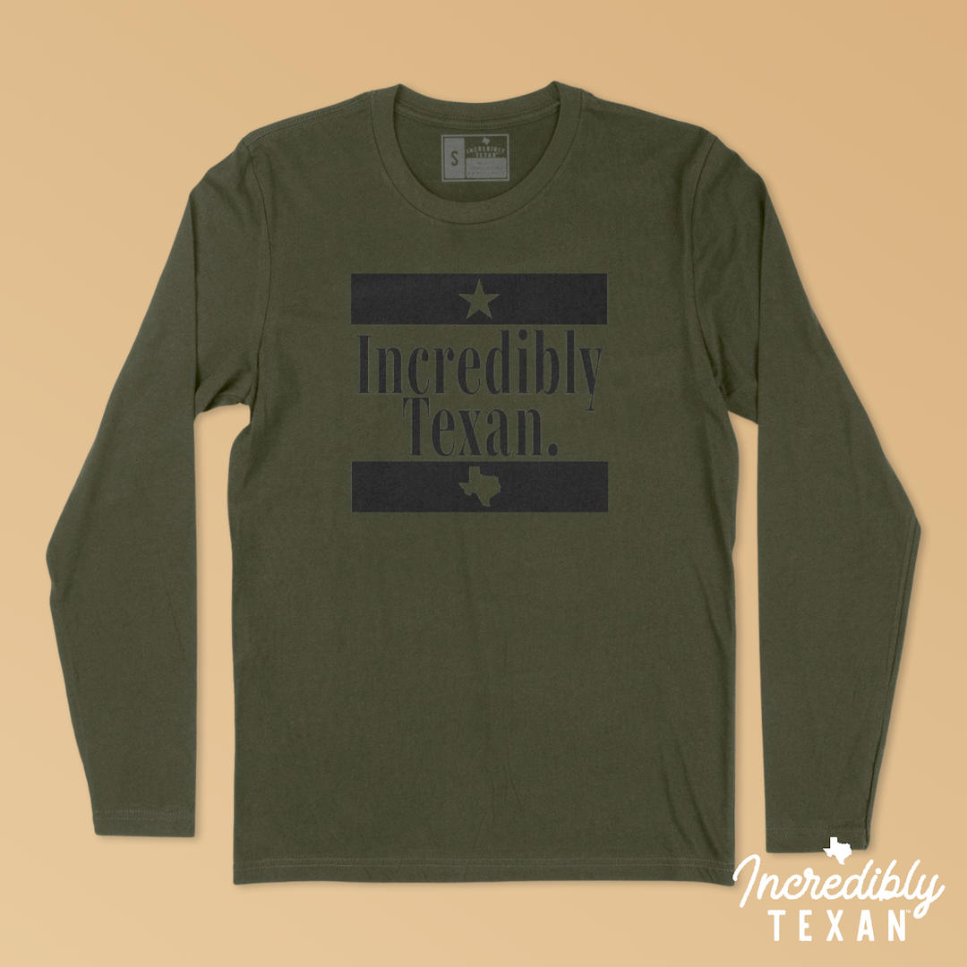 An olive green long sleeve shirt with the words "Incredibly Texan" printed in black, with a black bar and star above and a black bar and Texas shape below.